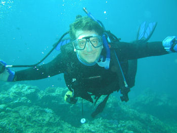 Andrew smiling under water